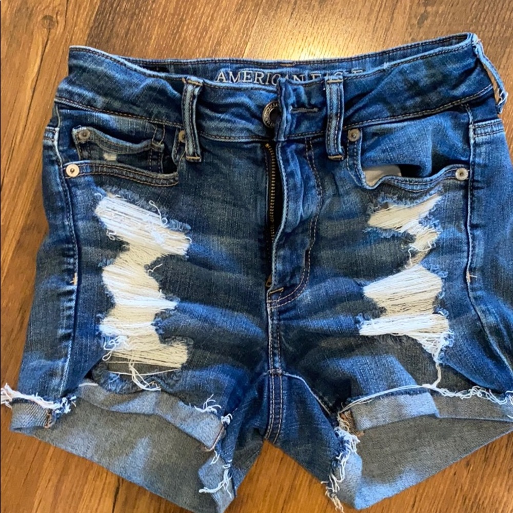 American Eagle denim distressed shorts.
